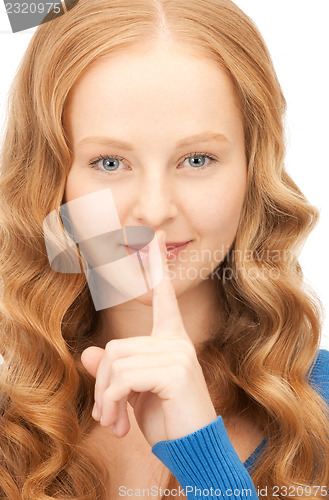 Image of finger on lips