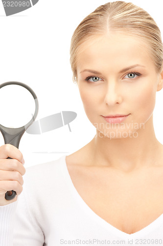 Image of woman with magnifying glass