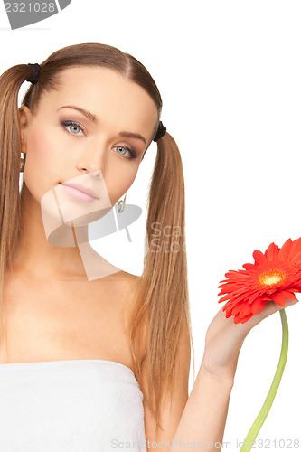 Image of lovely woman with red flower