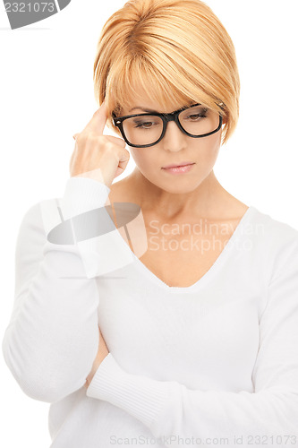 Image of pensive businesswoman over white