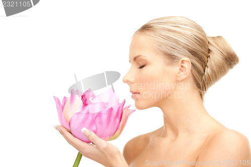 Image of beautiful woman with white flower