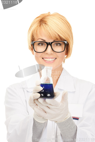 Image of lab worker holding up test tube