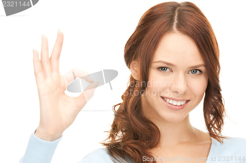 Image of woman showing ok sign