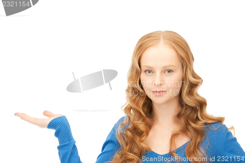 Image of confident woman with business card