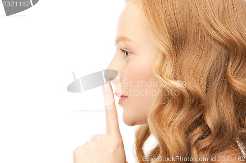 Image of finger on lips