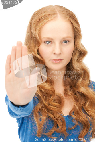 Image of woman making stop gesture