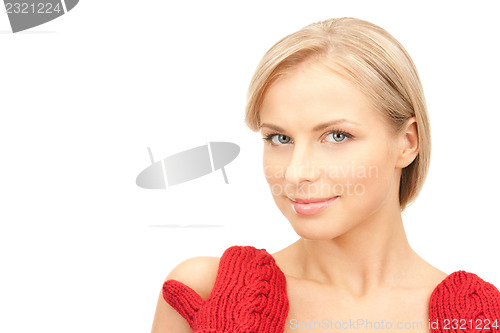 Image of beautiful woman in red mittens