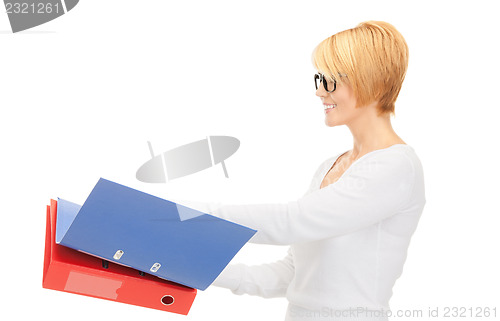 Image of businesswoman with folders