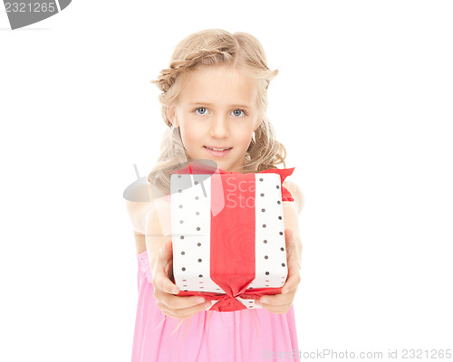 Image of happy little girl with gift box