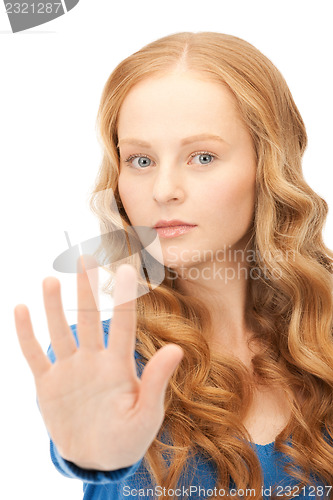 Image of woman making stop gesture