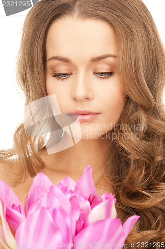 Image of beautiful woman with lotus flower