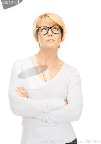 Image of pensive businesswoman over white