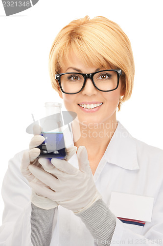 Image of lab worker holding up test tube