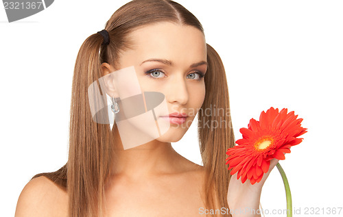 Image of lovely woman with red flower