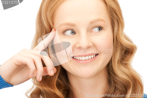Image of pensive businesswoman over white