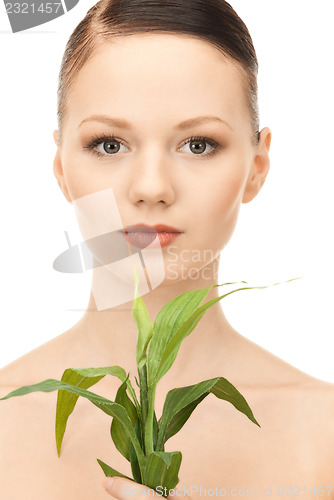 Image of woman with sprout