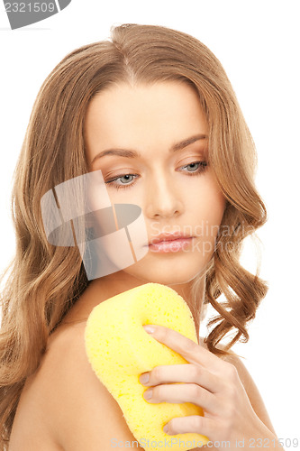 Image of beautiful woman with sponge