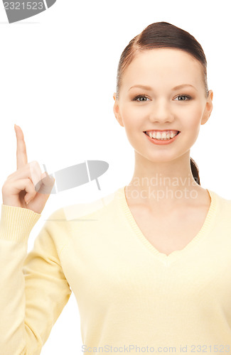 Image of  woman with her finger up	 