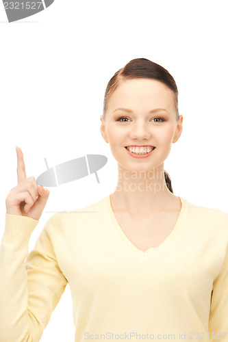 Image of  woman with her finger up	 