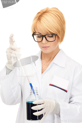 Image of lab worker holding up test tube