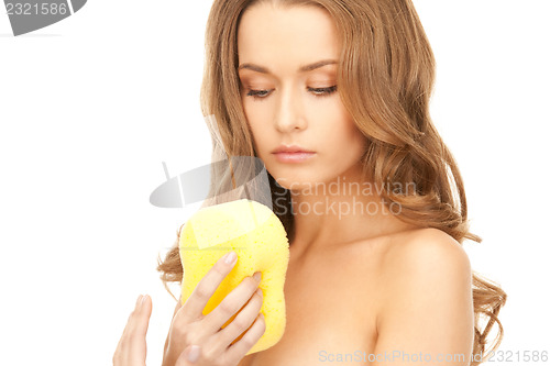 Image of beautiful woman with sponge