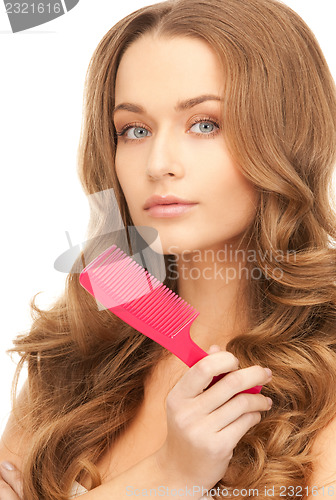 Image of beautiful woman with comb