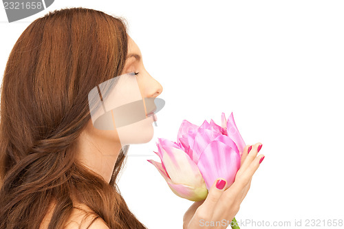 Image of beautiful woman with lotus flower