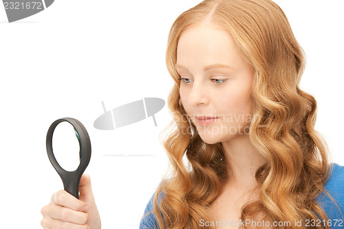 Image of woman with magnifying glass 