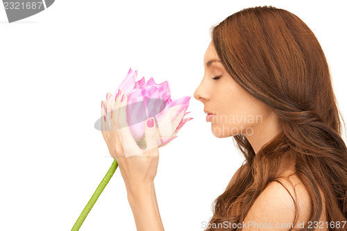 Image of beautiful woman with lotus flower