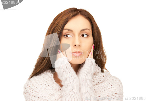 Image of beautiful woman in mittens 