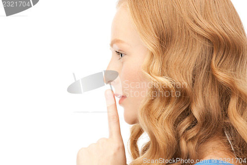 Image of finger on lips