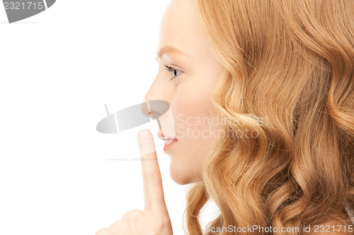 Image of finger on lips