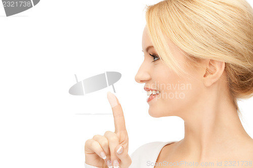 Image of finger on lips