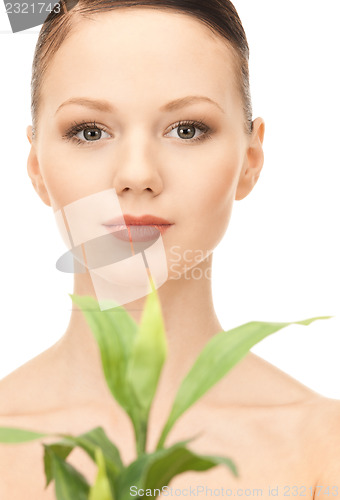 Image of woman with sprout