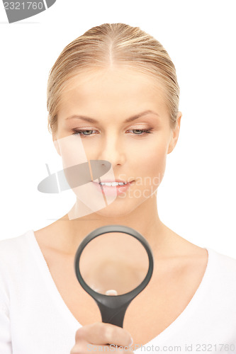 Image of woman with magnifying glass