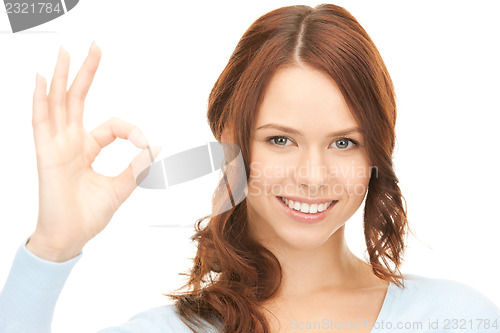 Image of woman showing ok sign