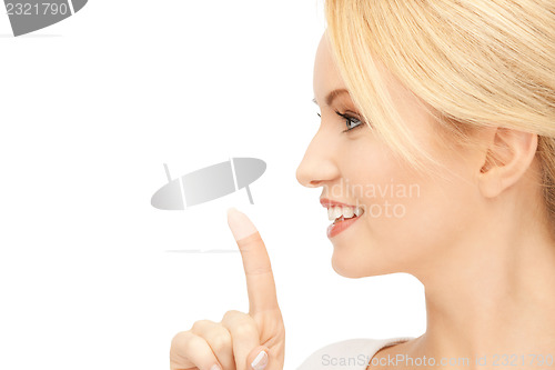 Image of finger on lips