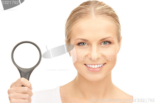 Image of woman with magnifying glass