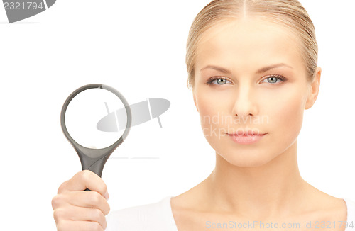 Image of woman with magnifying glass