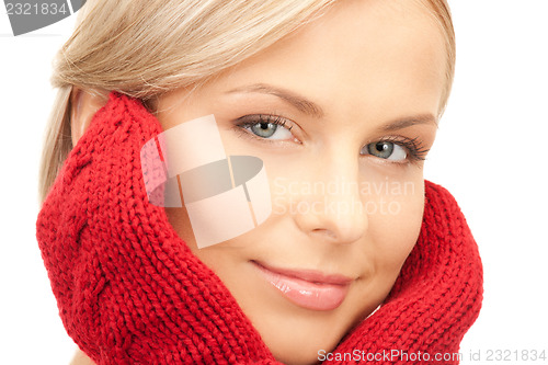 Image of beautiful woman in red mittens