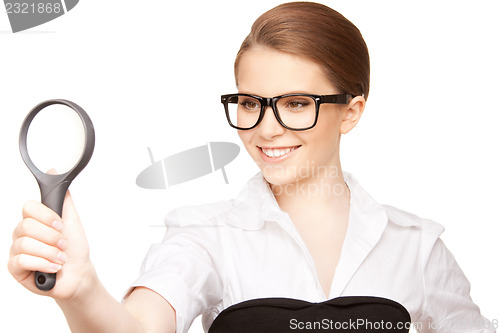 Image of woman with magnifying glass