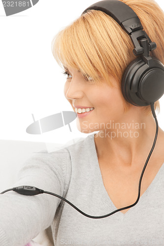 Image of happy woman in headphones