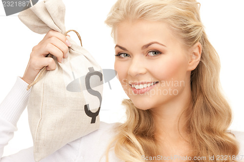 Image of woman with dollar signed bag