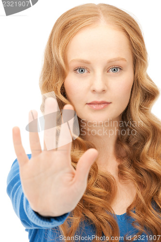 Image of woman making stop gesture