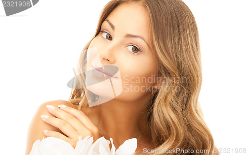 Image of beautiful woman with white flower