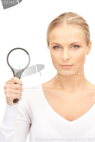 Image of woman with magnifying glass