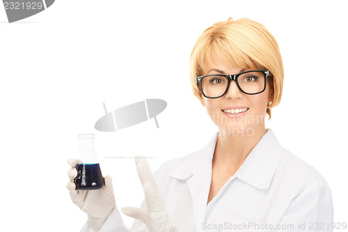 Image of lab worker holding up test tube