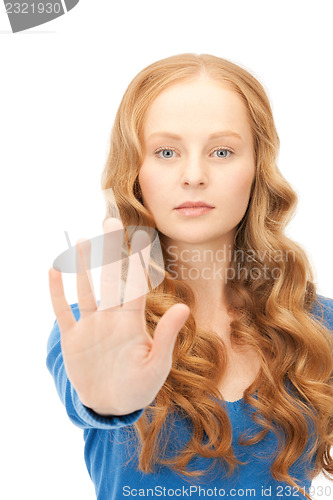 Image of woman making stop gesture