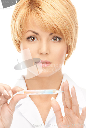 Image of attractive female doctor with thermometer