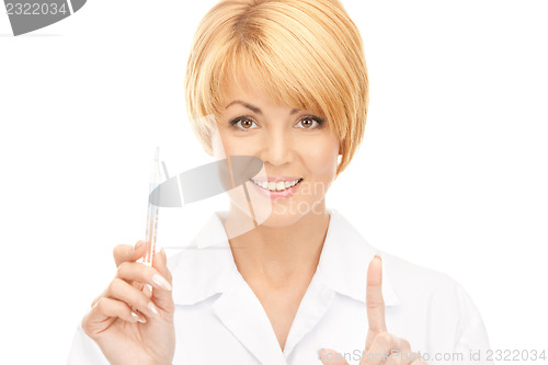 Image of attractive female doctor with thermometer